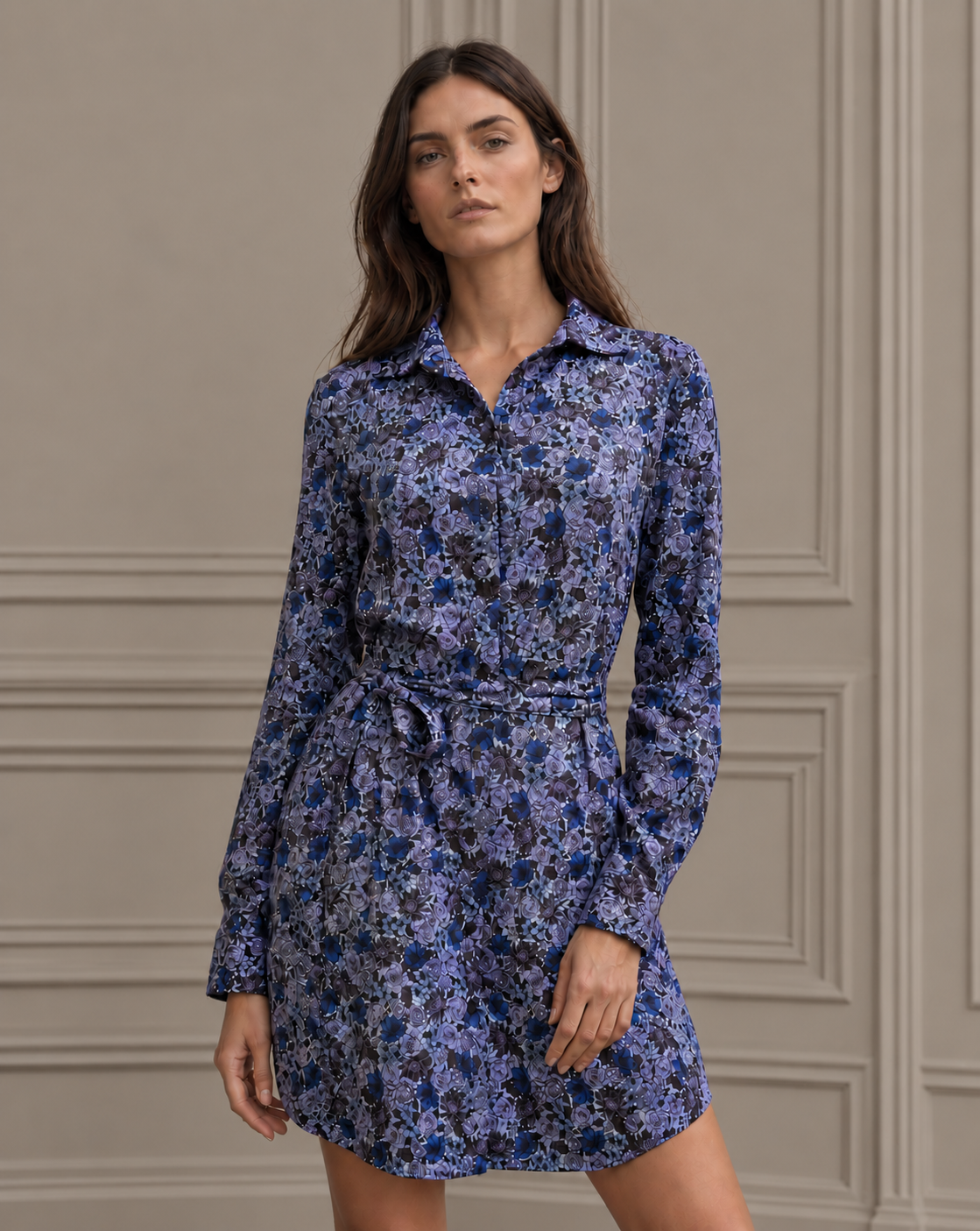 A woman in the Lords of Harlech Dot shirt dress in Ternberg Floral brownie
