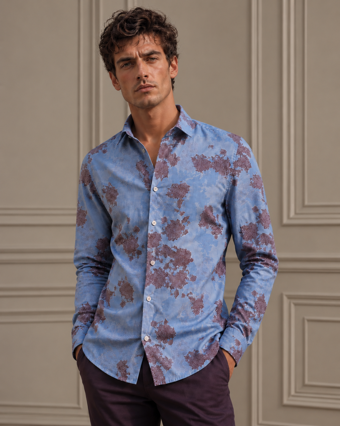A man in the Lords of Harlech Nigel long-sleeve shirt in Lans Floral blue